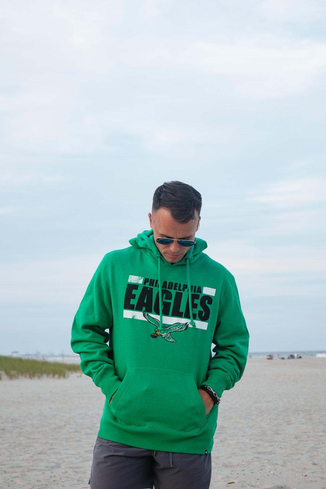 Philadelphia Eagles Kelly Green Back Line Headline Retro Logo Long Sleeve Hoodie